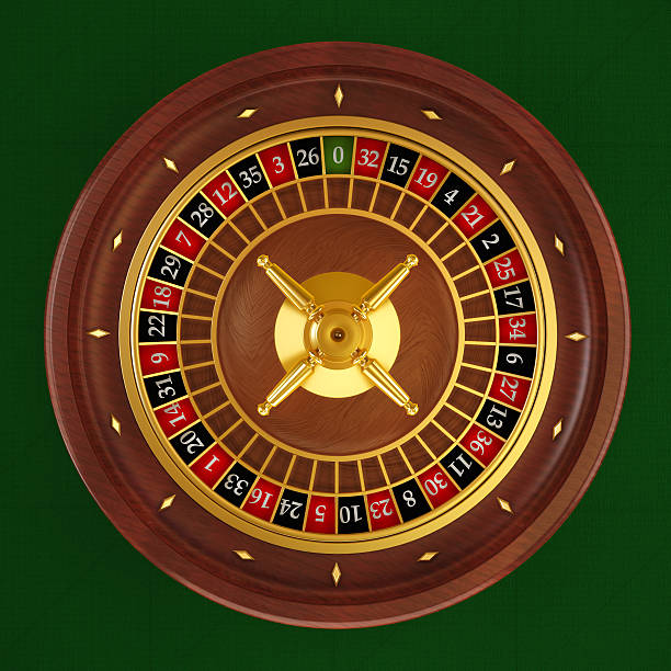 Live dealer dealing cards at a baccarat table